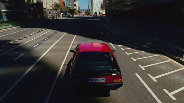 Video Reference: Automotive parking light, Automotive tail & brake light, Vehicle registration plate, Vehicle, Car, Automotive lighting, Infrastructure, Motor vehicle, Road surface, Building