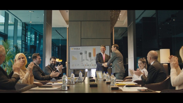 Video Reference: Table, Organism, Tableware, Interaction, Suit, Desk, White-collar worker, Chair, Event, Job