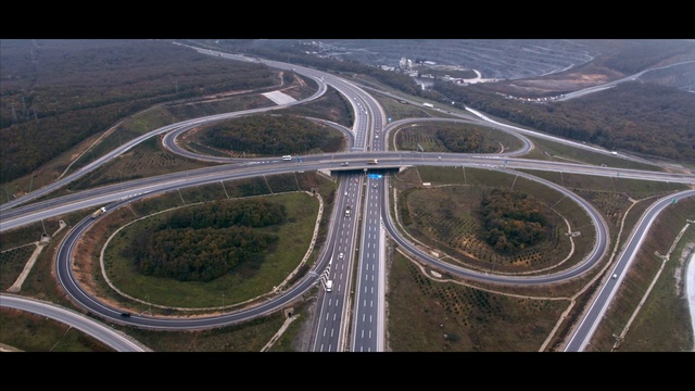 Video Reference: Water resources, Road surface, Infrastructure, Asphalt, Natural landscape, Mode of transport, Atmospheric phenomenon, Urban design, Landscape, Thoroughfare