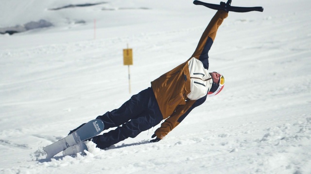 Video Reference: Sports equipment, Snow, Slope, Downhill ski boot, Outdoor recreation, Jacket, Freezing, Glove, Snowboarding, Sports