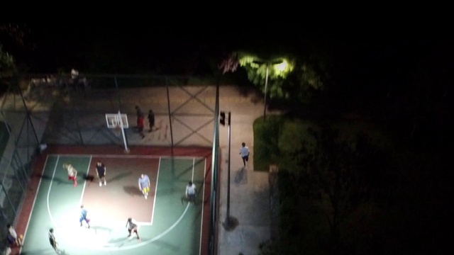 Video Reference: Automotive lighting, Sports equipment, Midnight, Football, Event, Tree, Entertainment, Darkness, Ball, Electricity