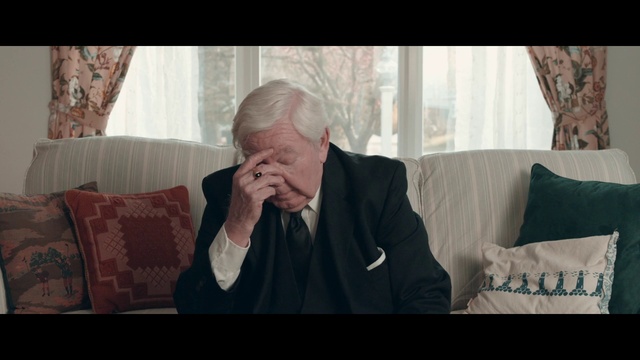 Video Reference: Couch, Comfort, Coat, Gesture, Suit, Happy, Wrinkle, Curtain, Tie, Formal wear