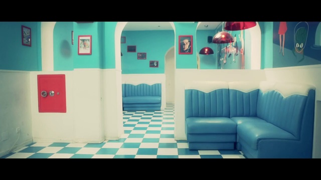 Video Reference: Azure, Couch, Interior design, Rectangle, Floor, Aqua, Flooring, Magenta, Tints and shades, Electric blue