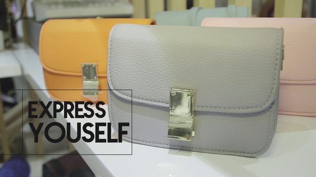 Video Reference: Product, Luggage and bags, Rectangle, Eyewear, Bag, Material property, Font, Armrest, Beige, Shoulder bag