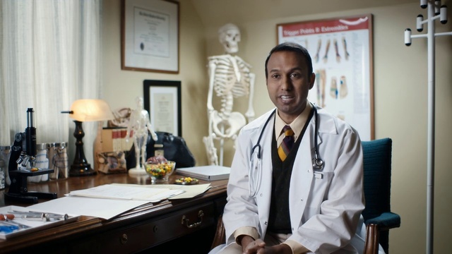 Video Reference: Picture frame, Table, Stethoscope, Building, Health care, Tie, Medical equipment, Eyewear, Service, White coat