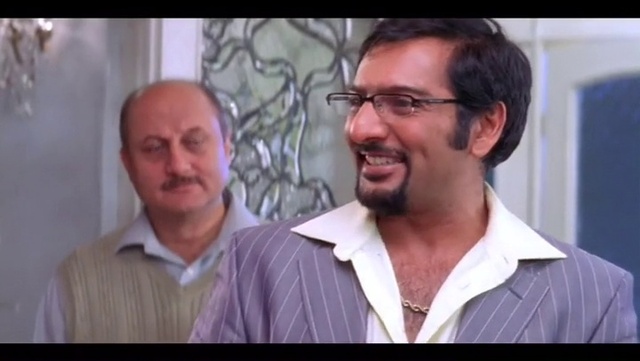 Video Reference: Forehead, Glasses, Chin, Smile, Eyebrow, Vision care, Mouth, Jaw, Gesture, Sleeve