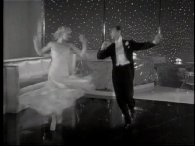 Video Reference: Dance, Flash photography, Entertainment, Standing, Dress, Gesture, Style, Black-and-white, Performing arts, Choreography