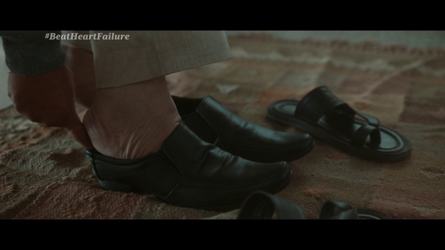 Video Reference: Shoe, Flooring, Font, Automotive tire, Synthetic rubber, Human leg, Knee, Personal protective equipment, Foot, Sandal