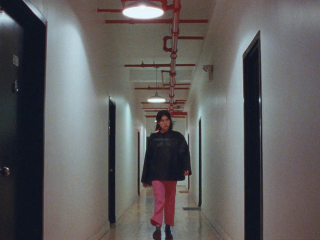 Video Reference: Sleeve, Fixture, Flooring, Floor, Street fashion, Wall, Material property, Magenta, Luggage and bags, Bag