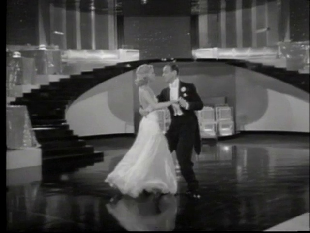 Video Reference: Wedding dress, Bride, Bridal clothing, Dress, Flash photography, Bridal party dress, Happy, Gown, Gesture, Architecture