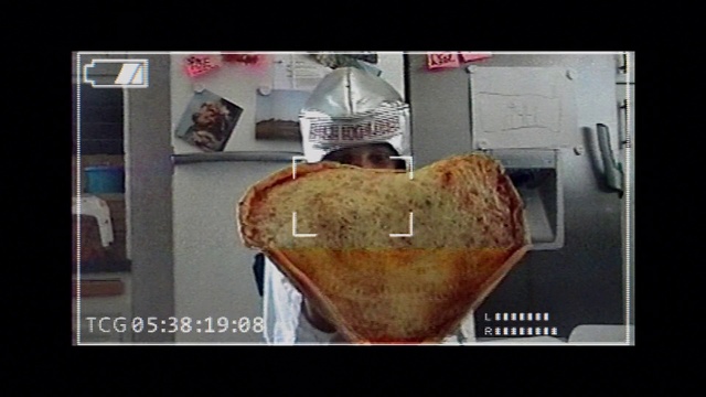 Video Reference: Jaw, Rectangle, Font, Wood, Dish, Cuisine, Kitchen appliance, Metal, Junk food, Square