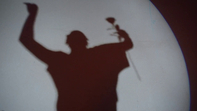 Video Reference: Hand, Arm, Gesture, Finger, Tints and shades, Art, Font, Sleeve, Thumb, Wrist