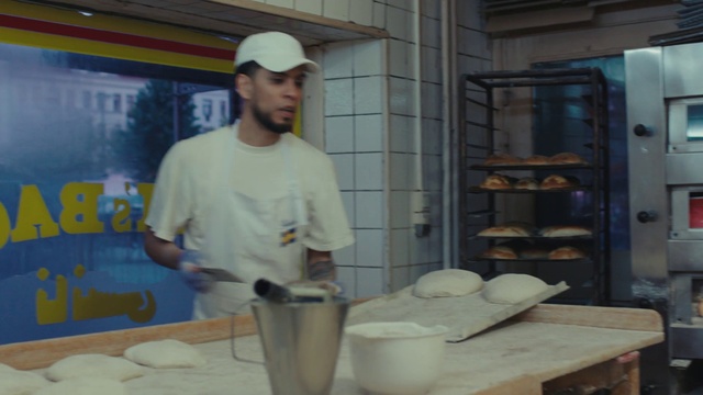 Video Reference: Sleeve, Baseball cap, Serveware, Tableware, Gas, Cap, T-shirt, Cooking, Mixing bowl, Wood