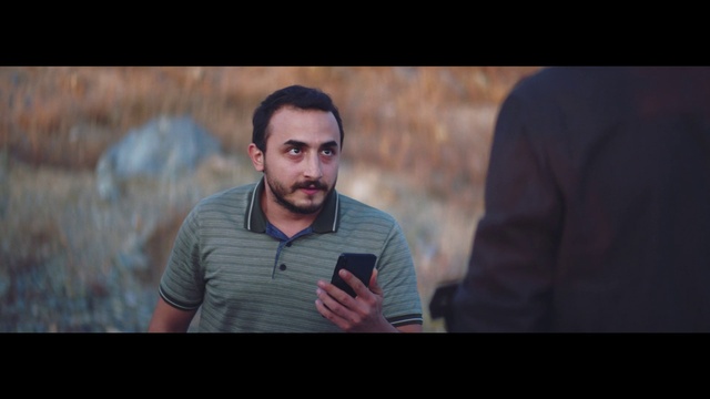 Video Reference: Forehead, Flash photography, Gesture, Beard, Happy, Facial hair, Event, Formal wear, Landscape, Fun