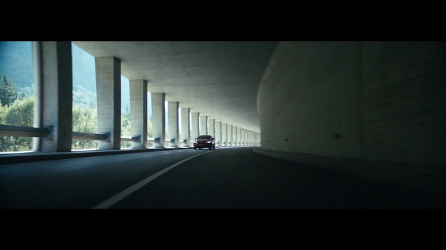 Video Reference: Automotive lighting, Automotive design, Asphalt, Car, Road surface, Vehicle, Sky, Rectangle, Thoroughfare, Road