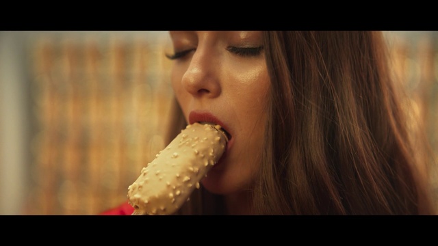 Video Reference: Nose, Lip, Mouth, Jaw, Eyelash, Food craving, Ice cream cone, Finger, Audio equipment, Biting