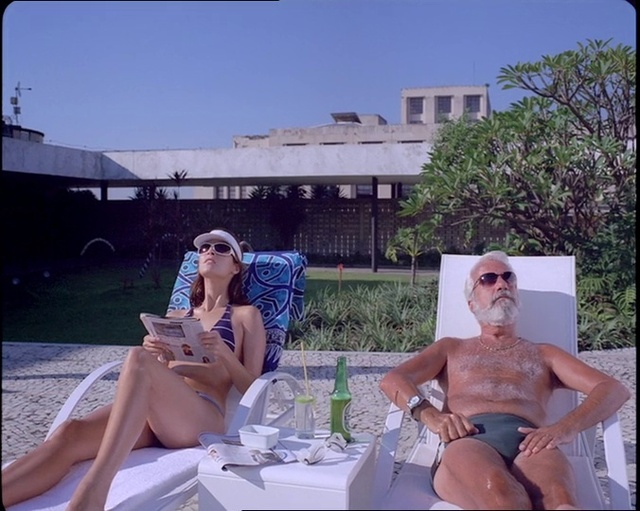Video Reference: Leg, Sky, Eyewear, Outdoor furniture, Sunglasses, Thigh, Cool, Leisure, Rectangle, Grass