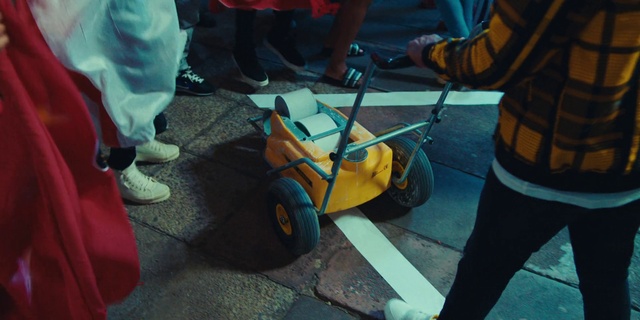 Video Reference: Tire, Wheel, Shoe, Motor vehicle, Automotive tire, Tread, Asphalt, Road surface, Sneakers, Fender