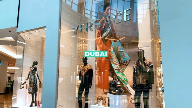 Video Reference: Building, Art, Sky, Facade, Retail, City, Crane, Event, Fashion design, Commercial building