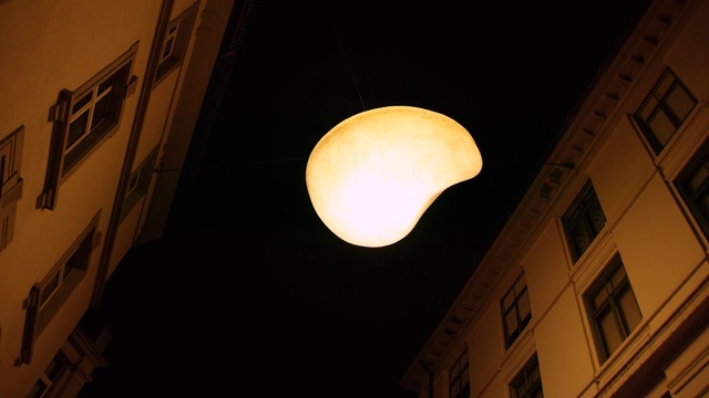 Video Reference: Atmosphere, Daytime, Building, Window, Sky, Electricity, Material property, Lamp, Tints and shades, Street light