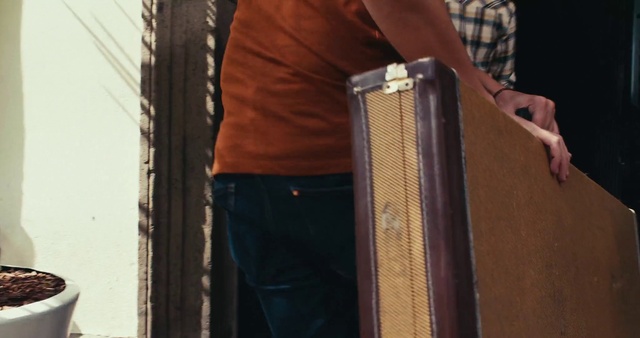 Video Reference: Wood, Sleeve, Standing, Waist, Street fashion, Denim, Musician, Hardwood, Music, Folk instrument