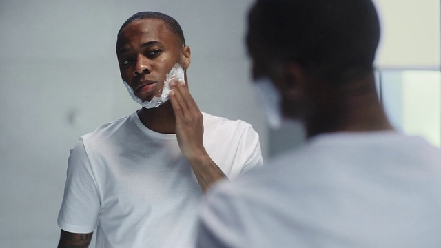 Video Reference: Shoulder, Mouth, Eyelash, Neck, Human body, Jaw, Ear, Sleeve, Gesture, Dress shirt