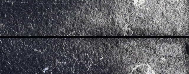 Video Reference: Road surface, Grey, Wood, Asphalt, Font, Grass, Automotive tire, Pattern, Metal, Concrete