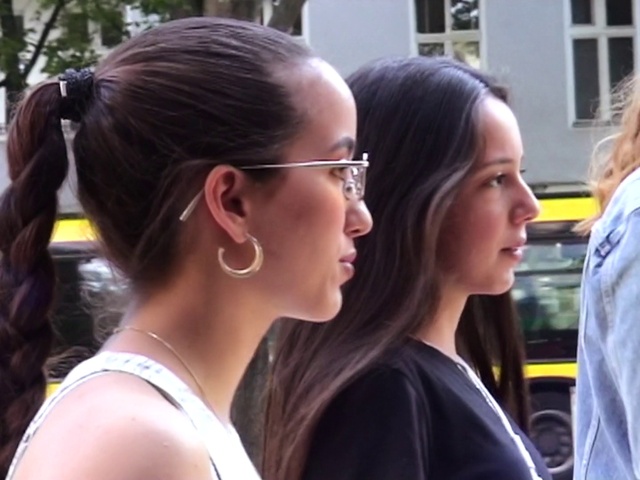 Video Reference: Chin, Daytime, Vision care, Shoulder, Facial expression, Ear, Eyewear, Mammal, Gesture, Interaction