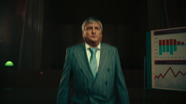 Video Reference: Blazer, Suit, Dress shirt, Formal wear, Beard, Event, Flash photography, White-collar worker, Electric blue, Facial hair