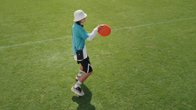 Video Reference: Playing sports, Sports equipment, Shorts, People in nature, Player, Toy, Grass, Ball game, Sneakers, Ball