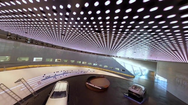 Video Reference: Building, Light, Automotive design, Lighting, Interior design, Architecture, Field house, Line, Metropolitan area, Ceiling