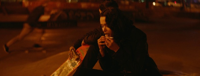 Video Reference: Fun, Jacket, Musician, Event, Wind instrument, Tableware, Sitting, Darkness, Midnight, Night