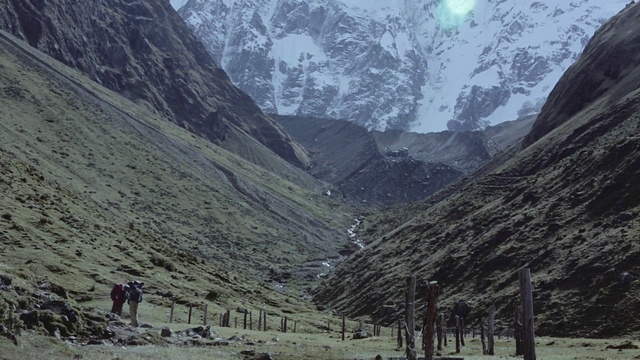 Video Reference: Mountain, Plant, White, Slope, Snow, Natural landscape, Highland, Tree, Mountainous landforms, Mountain range