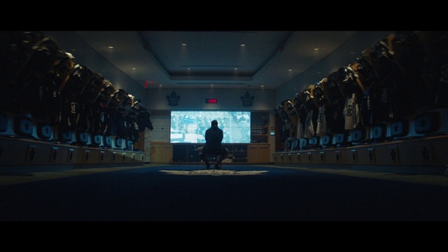 Video Reference: Building, Standing, Entertainment, Art, House, Sky, Event, Projection screen, City, Display device