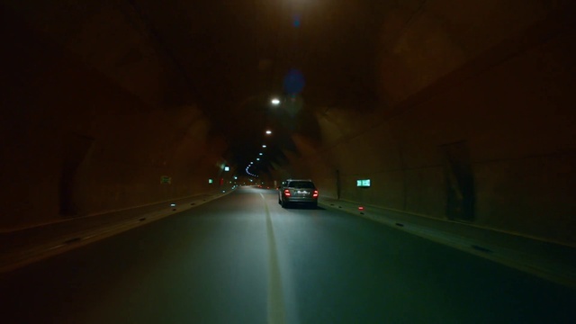 Video Reference: Automotive lighting, Car, Window, Vehicle, Street light, Road surface, Mode of transport, Asphalt, Headlamp, Electricity