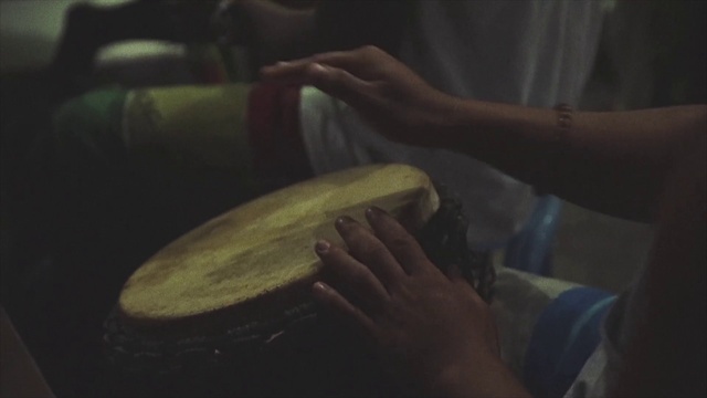 Video Reference: Membranophone, Hand, Drum, Drumhead, Musical instrument, Musical instrument accessory, Musician, Percussionist, Hand drum, Elbow