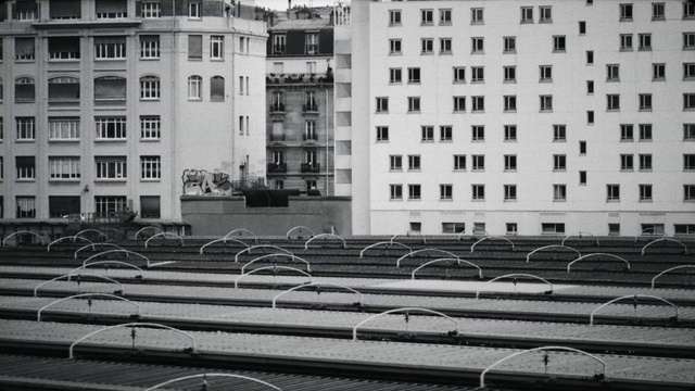 Video Reference: Building, Window, Urban design, Black-and-white, Style, Line, Tower block, Condominium, City, Facade