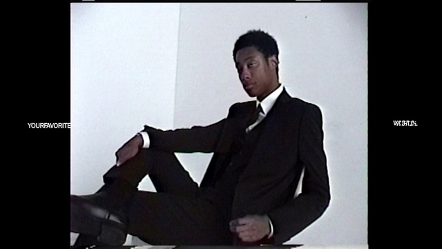 Video Reference: Dress shirt, Flash photography, Sleeve, Gesture, Collar, Font, Blazer, Formal wear, Suit, White-collar worker