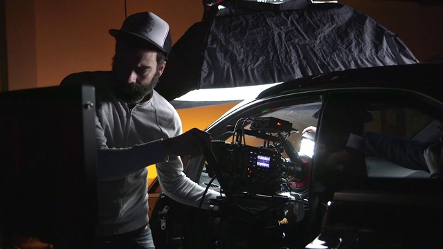 Video Reference: Motor vehicle, Hood, Automotive lighting, Vehicle, Automotive design, Car, Hat, Automotive exterior, Cap, Flash photography