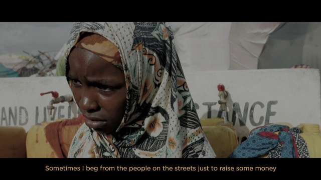 Video Reference: Eyelash, Military camouflage, Happy, Black hair, Font, Event, Toddler, Fashion design, Jewellery, Soldier