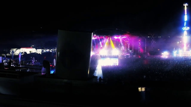 Video Reference: Purple, Building, Concert, Entertainment, Performing arts, Sky, Electricity, Visual effect lighting, Magenta, Music