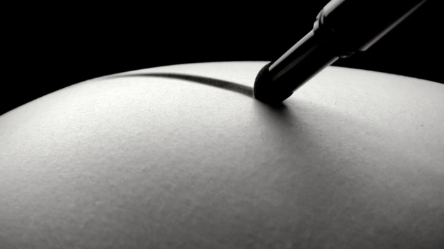 Video Reference: Hand, Office supplies, Writing implement, Tints and shades, Audio equipment, Trunk, Elbow, Font, Water, Human leg
