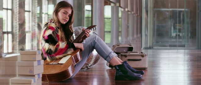 Video Reference: Shoe, Street fashion, Bag, Sleeve, Luggage and bags, Waist, Wood, Knee, Thigh, Interior design