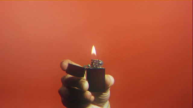 Video Reference: Candle, Wax, Gesture, Finger, Flame, Facial hair, Tints and shades, Thumb, Fire, Heat