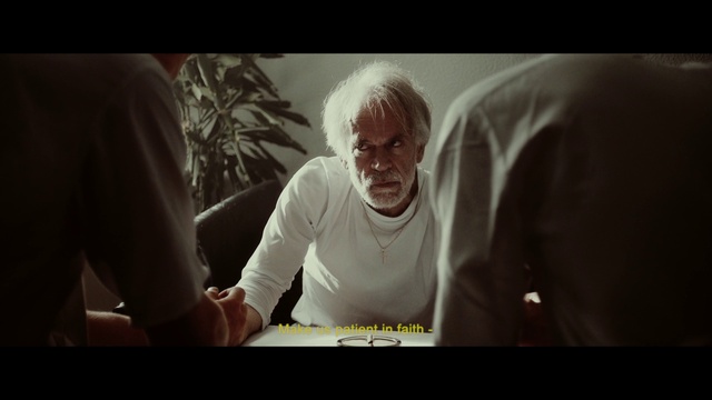 Video Reference: Flash photography, Gesture, Happy, Darkness, T-shirt, Font, Event, Fun, Sitting, Conversation