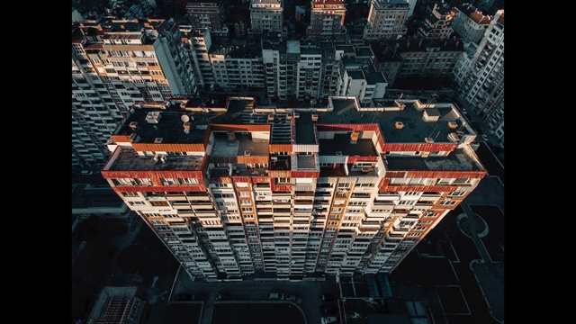 Video Reference: World, Building, Urban design, Neighbourhood, Font, Residential area, Symmetry, City, Tints and shades, Metropolis