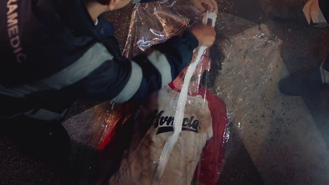 Video Reference: Sleeve, Zombie, Plastic bag, Human leg, Event, Automotive lighting, Carmine, Leather jacket, Fashion design, Thigh
