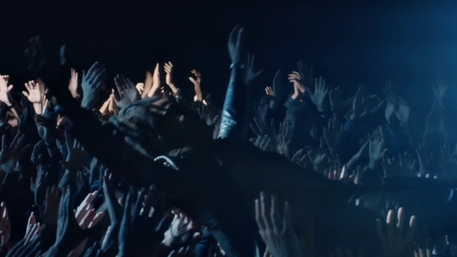 Video Reference: Hand, Gesture, Concert, Entertainment, Font, Performing arts, Electric blue, Event, Music, Fish