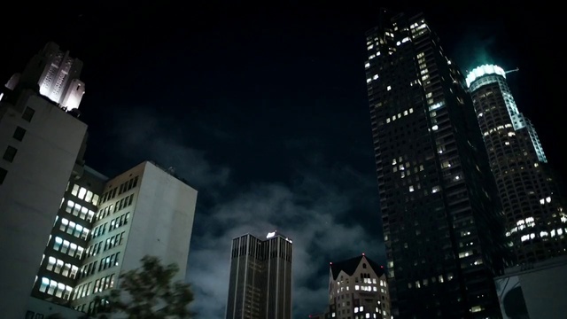 Video Reference: Building, Skyscraper, Cloud, Atmosphere, Sky, Light, Window, Tower block, Atmospheric phenomenon, Condominium