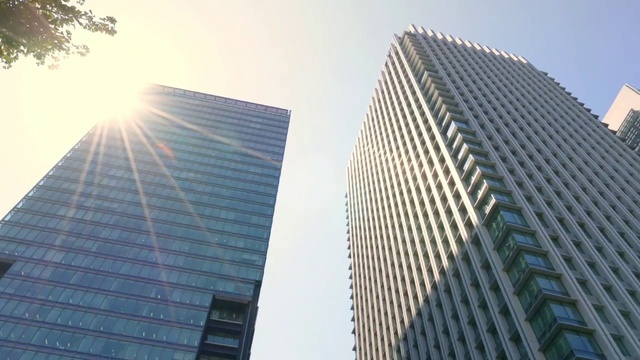 Video Reference: Skyscraper, Building, Sky, Daytime, Light, Tower block, Window, Urban design, Material property, Condominium